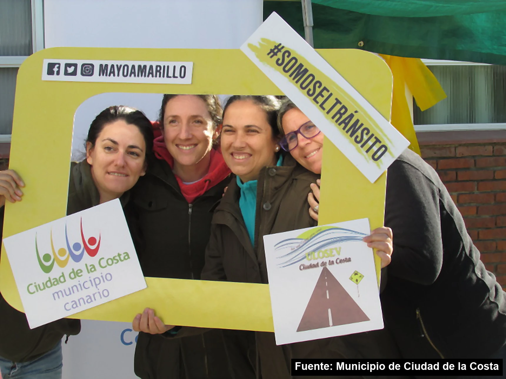 Mayo Amarillo en Ciudad de la Costa 8 Integrantes de la ULOSEV Ciudad de la Costa con el marco de Mayo Amarillo y los carteles del Municipio y de la unidad local, mayo de 2018