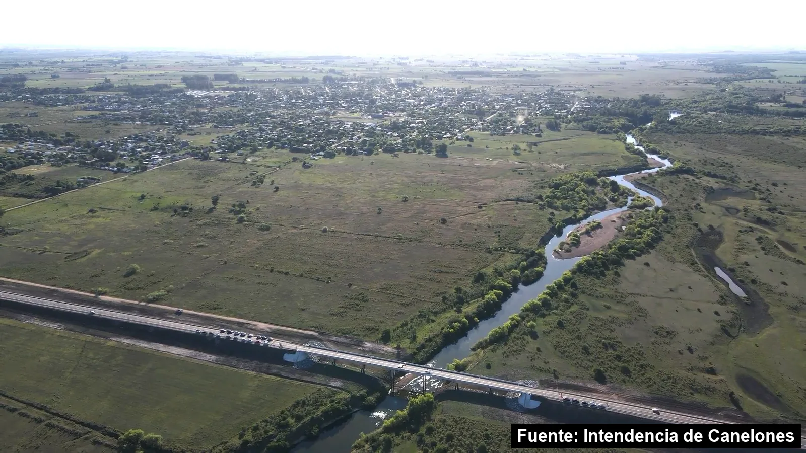 Mayo Amarillo en San Ramón 2 Vista aérea de San Ramón con un puente del nuevo bypass de la ruta 6 sobre el río